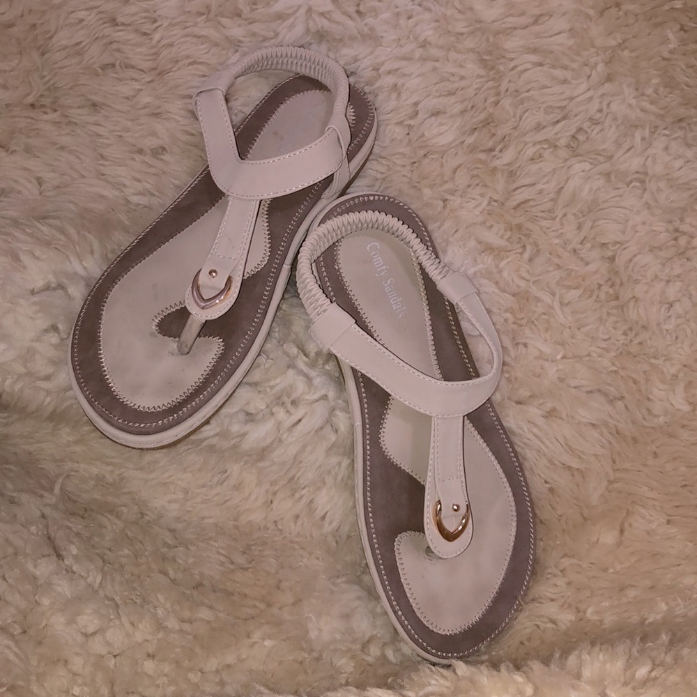 9-marked 42 tan Comfy sandals in Great shape! Great tread.